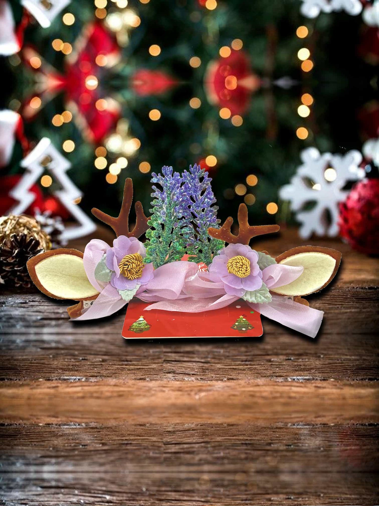 Enchanted Evergreen Reindeer Hair Clip: A Yuletide Bloom